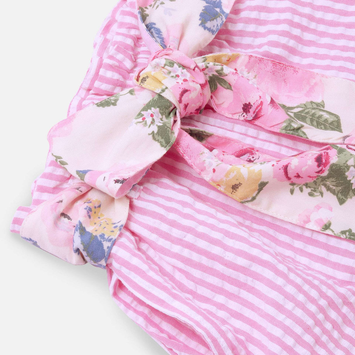 Close up of fabric rose print belt