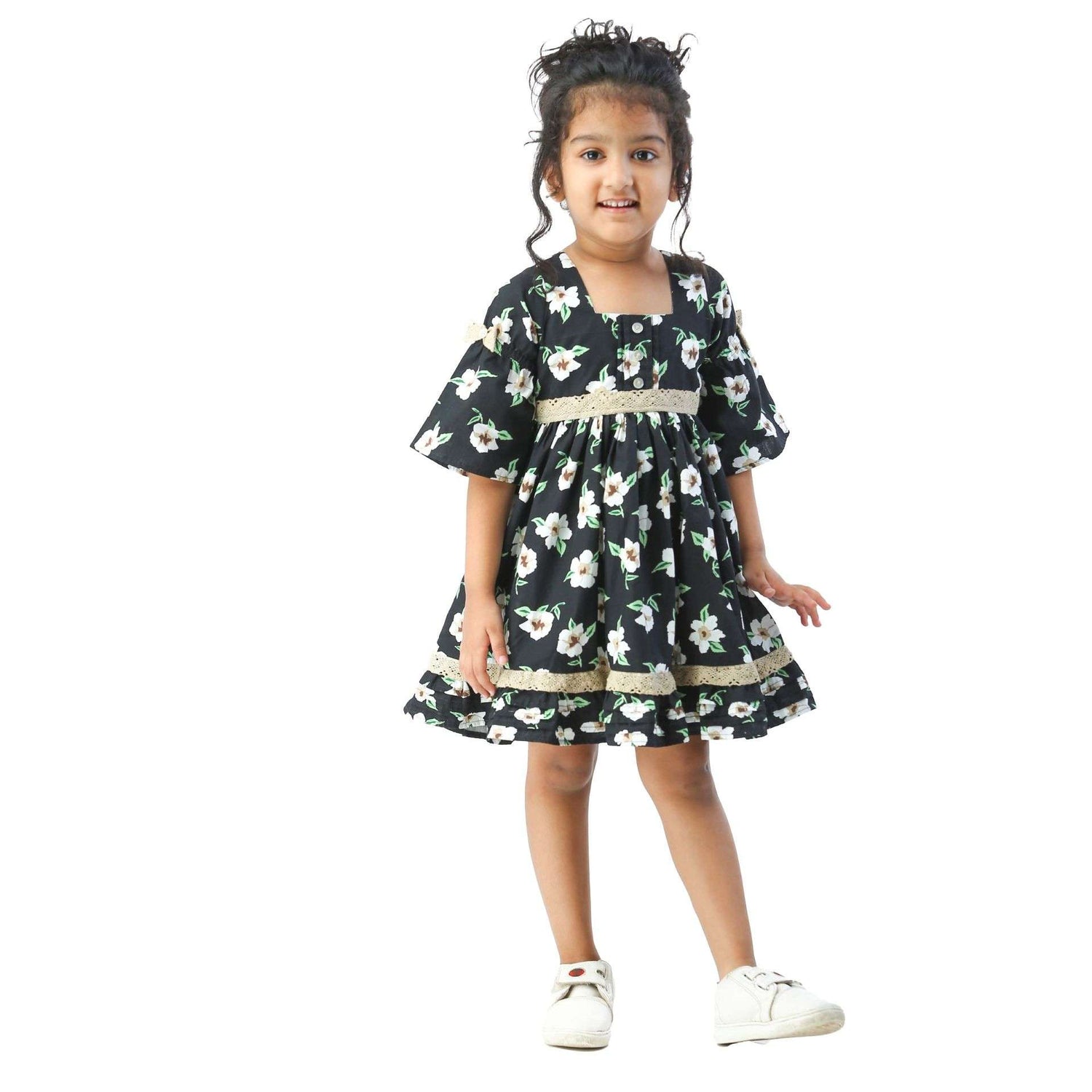 Girl wearing a casual dress with lace trims