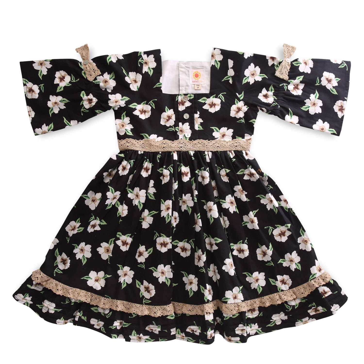 Flatlay of girls squareneckline three fourth sleeve Soleilclo dress with lace trims