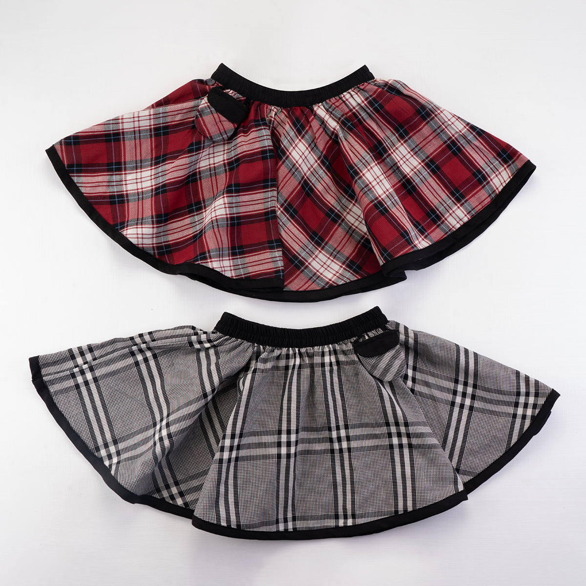 dual view of both sides of reversible checked skirt