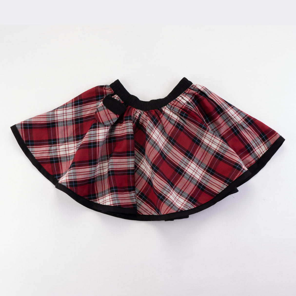 Front view of red checked side of the skirt