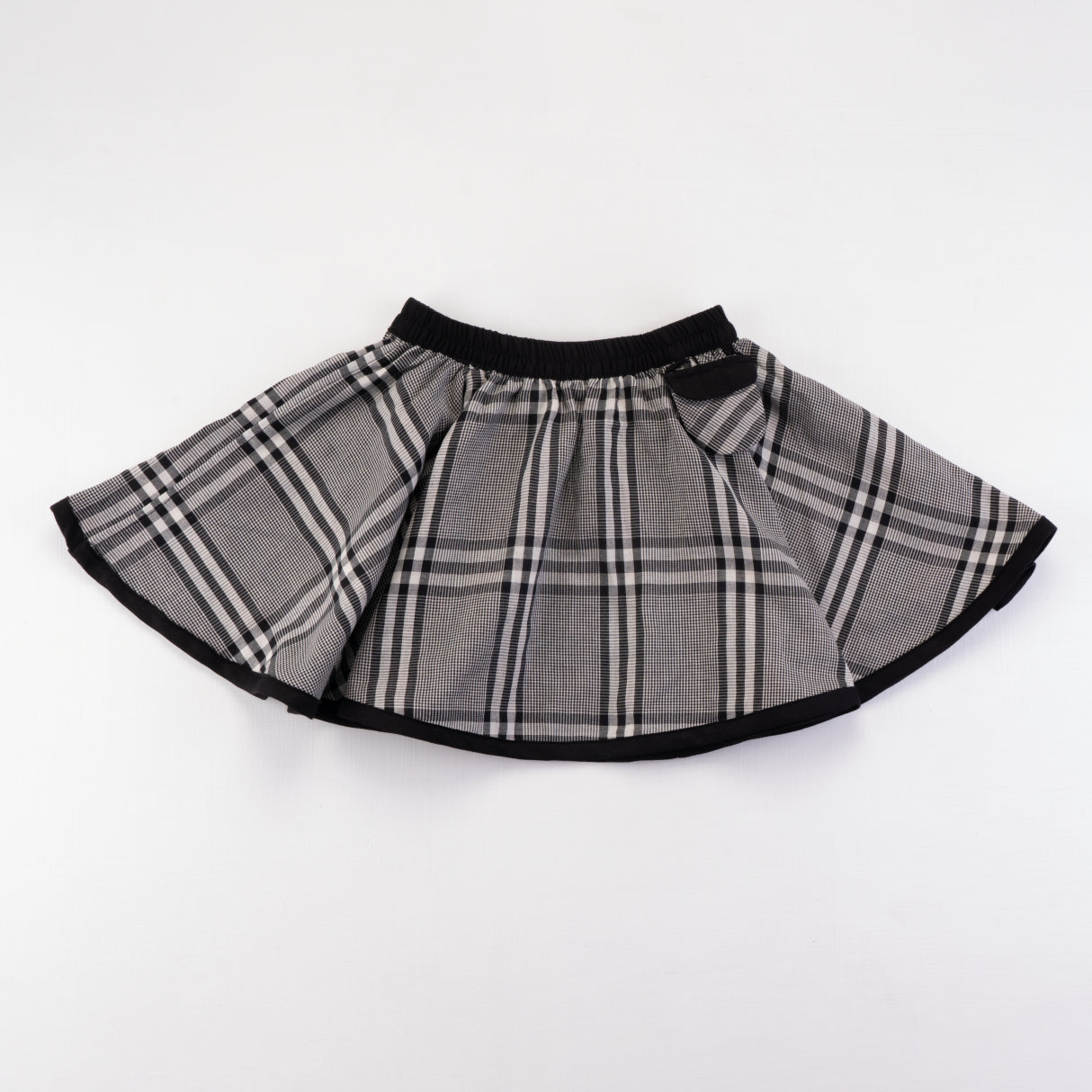 Front view of the black checked side of the skirt