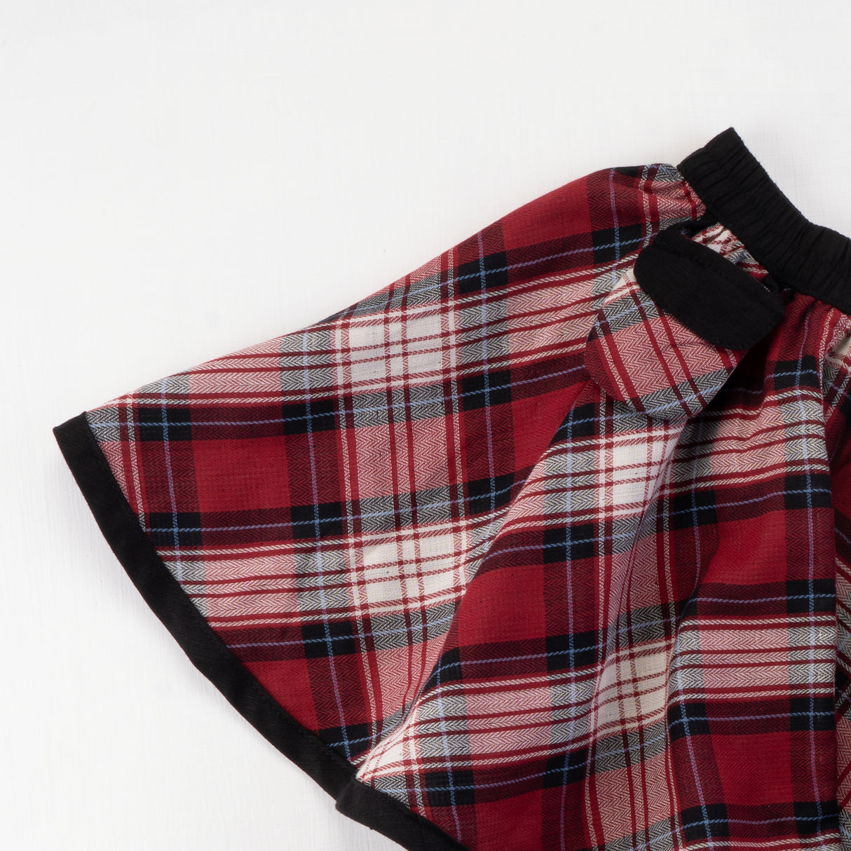 Close-up of the little pouch on the red checked side of the skirt