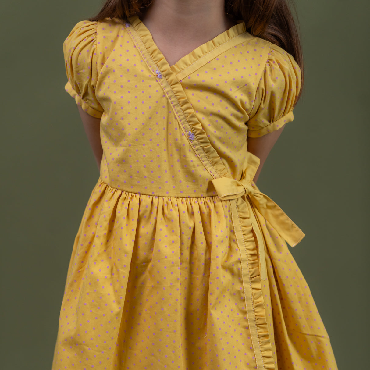 closeup of ruffle and sleeve detail