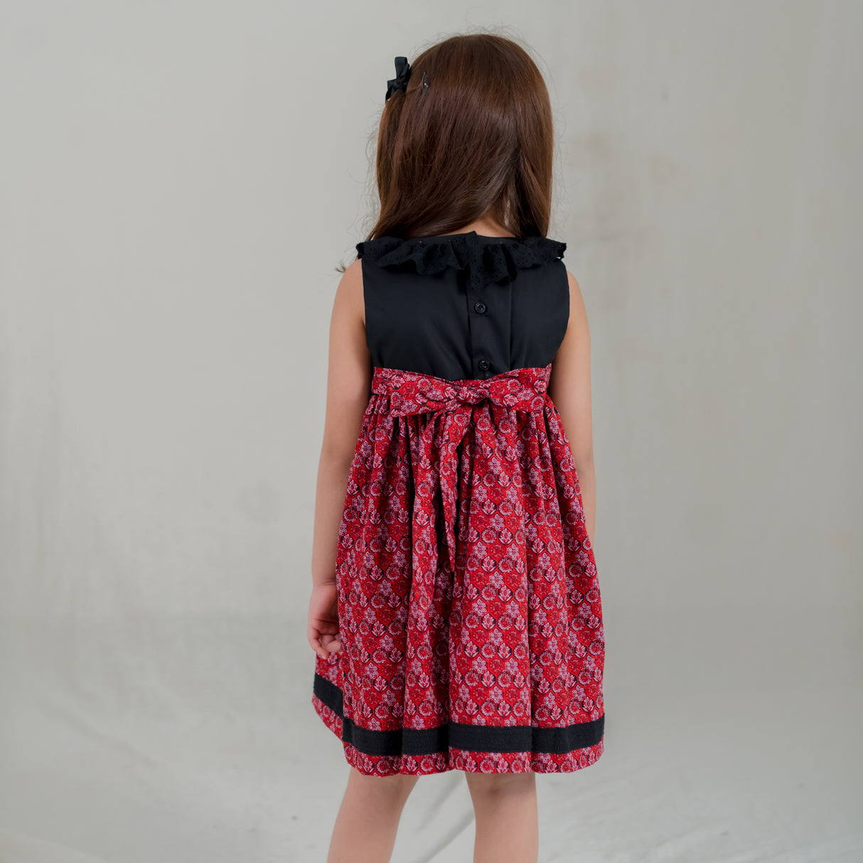 back view of the black scallop bodice dress