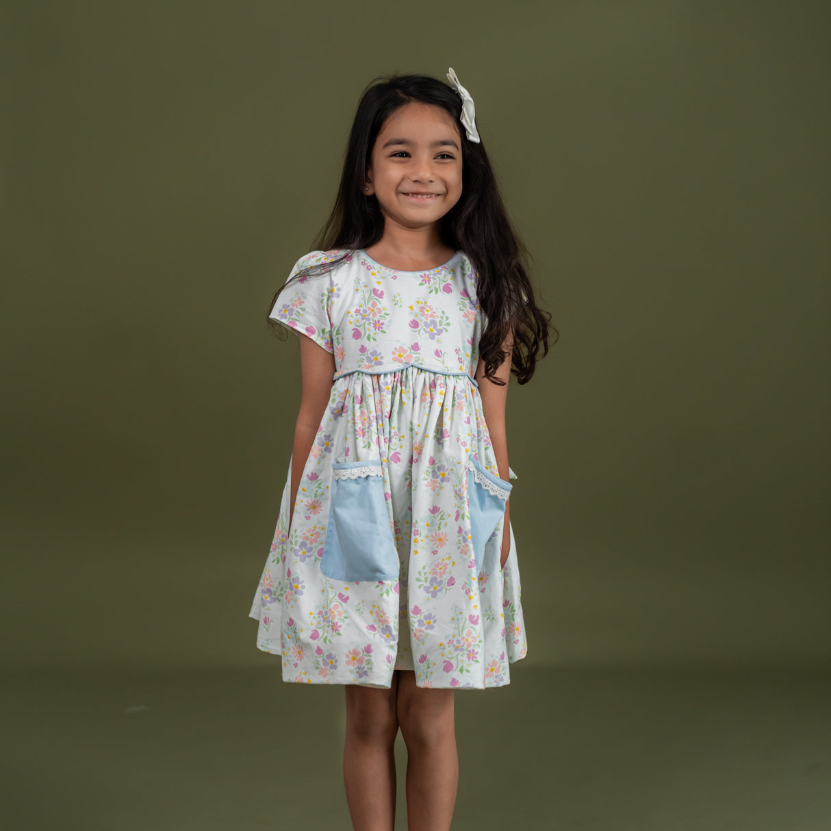 close-up of shadow bow embroidery on bodice