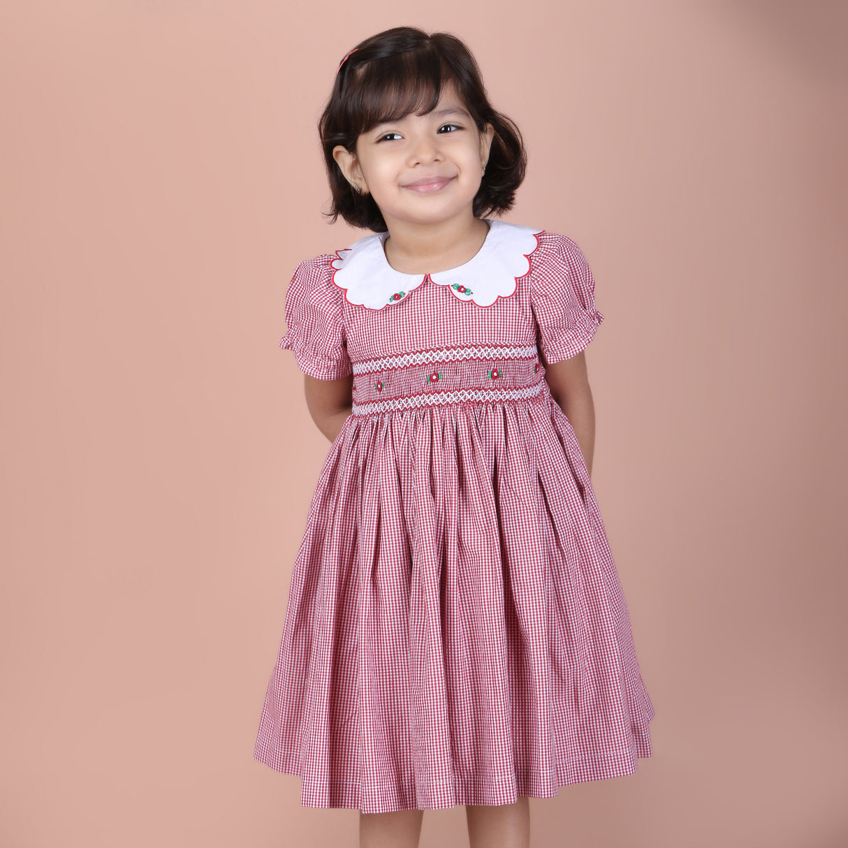 close-up of hand smocked embroidery detail