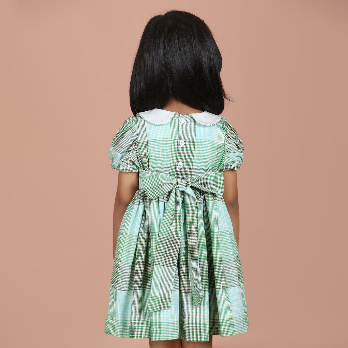 Back view of green check Peter Pan collar dress for girls