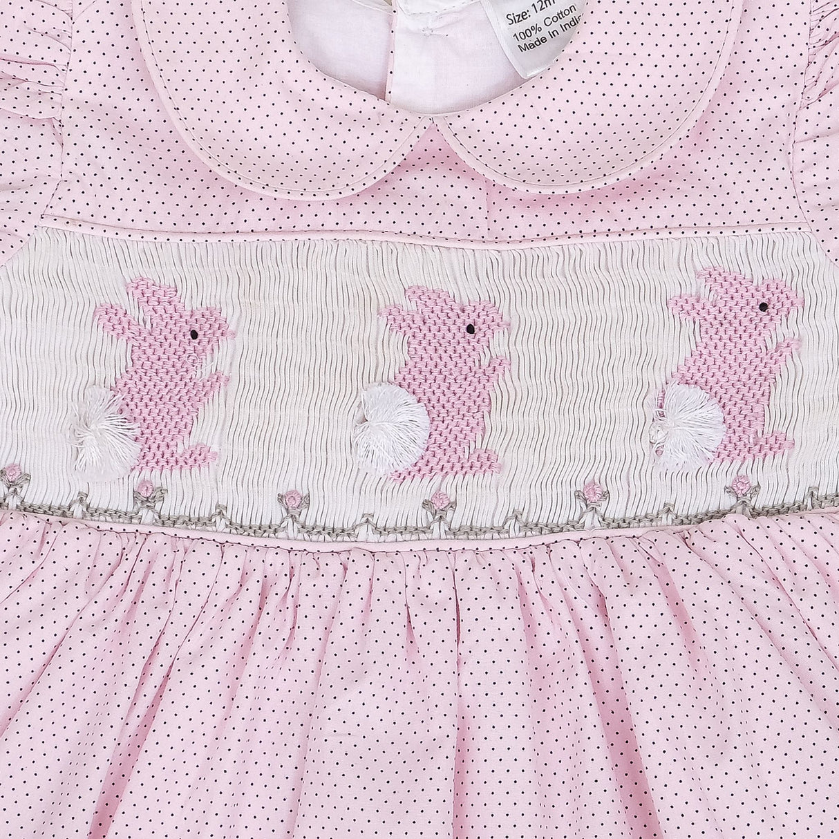 close-up of bunny smocked bodice with collar