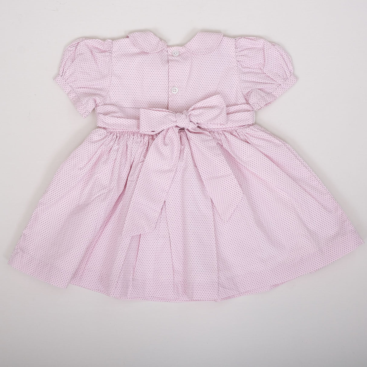 back view showing smocked detail