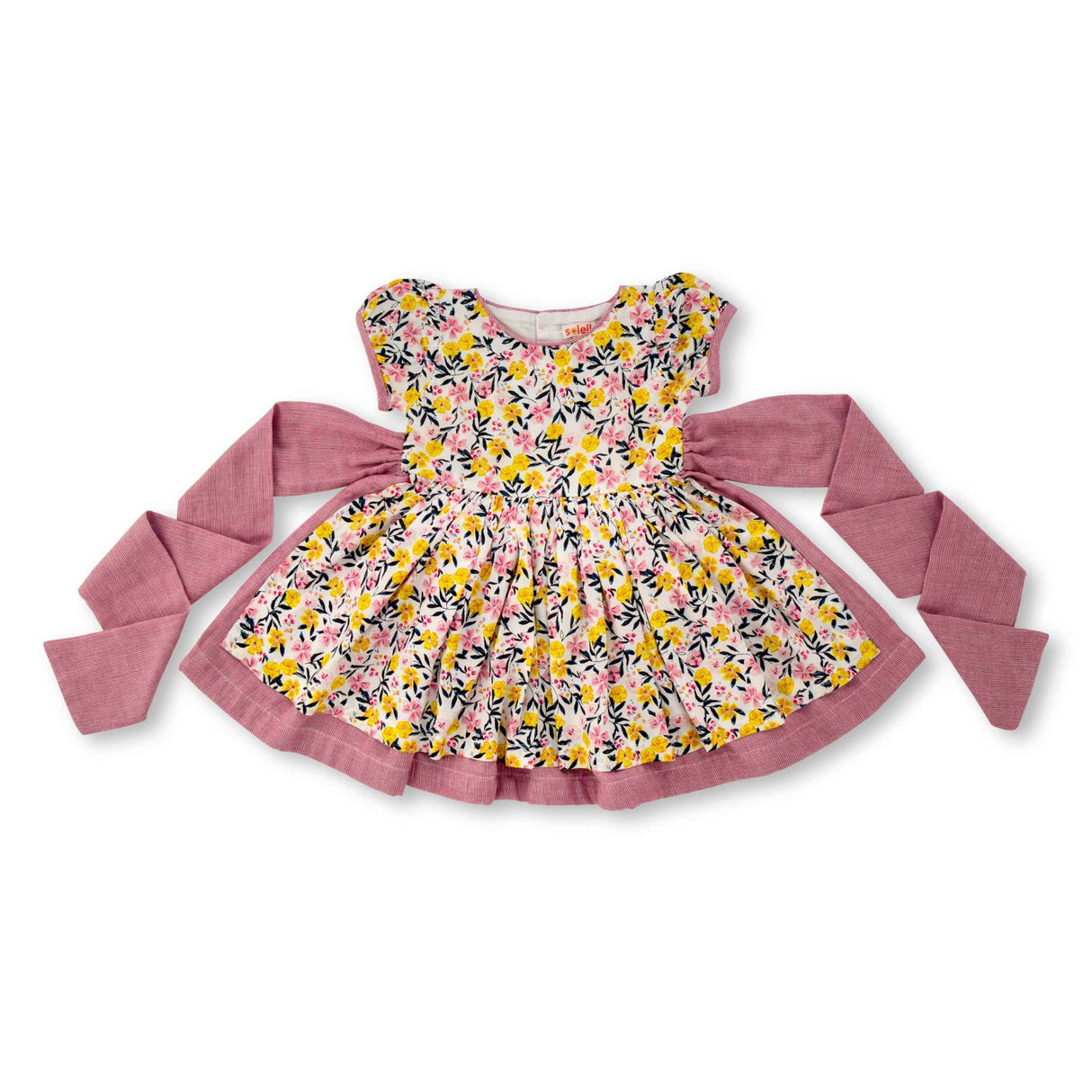 Flatlay of vintage style floral printed dress with a double layered skirt and back ties