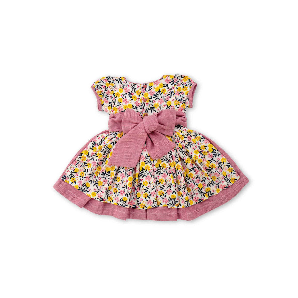 Flatlay of rear side of vintage style floral printed dress with a double layered skirt and back ties