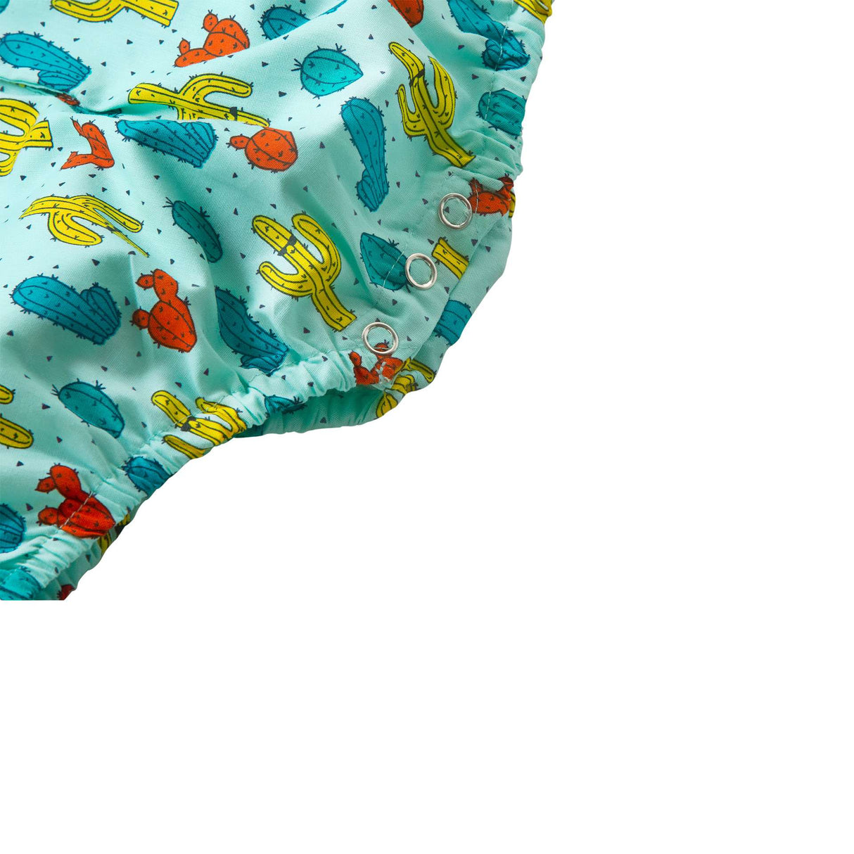 Close up of front open placket of cactus print onesie