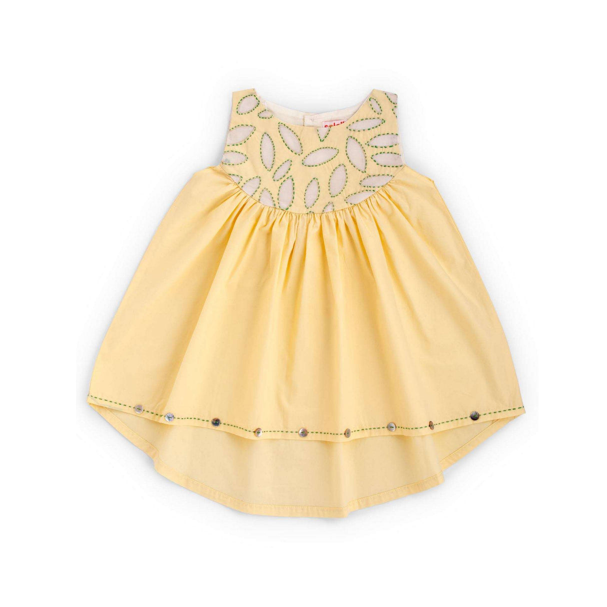 Flatlay of yellow applique cotton dress with a hi lo hem with hand embroidered kantha edging and shell button detail