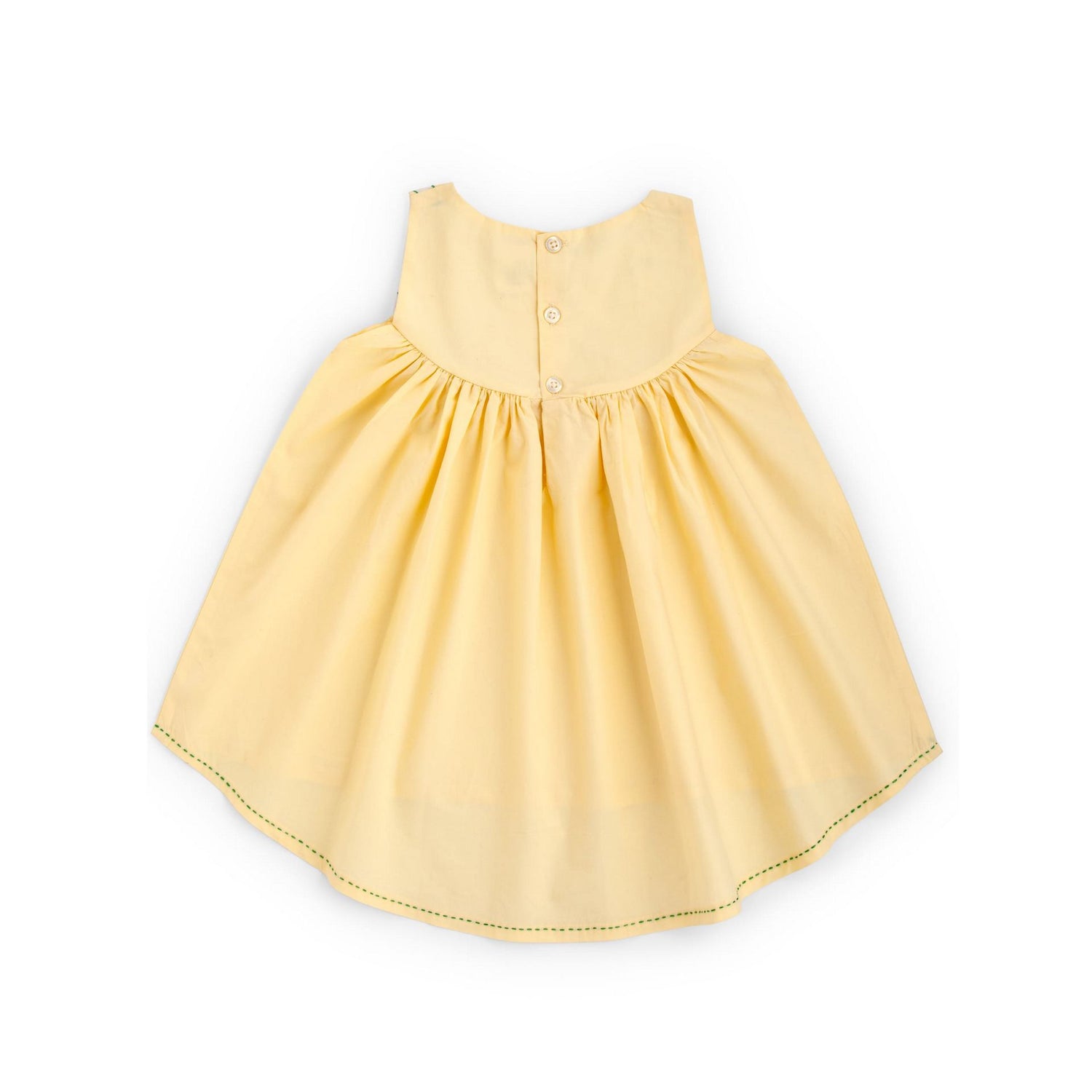 Flatlay of the rear side of yellow applique cotton dress with a hi lo hem with hand embroidered kantha edging