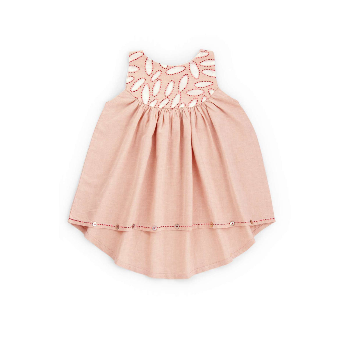 Flatlay of the peach applique cotton dress with a hi lo hem with hand embroidered kantha edging