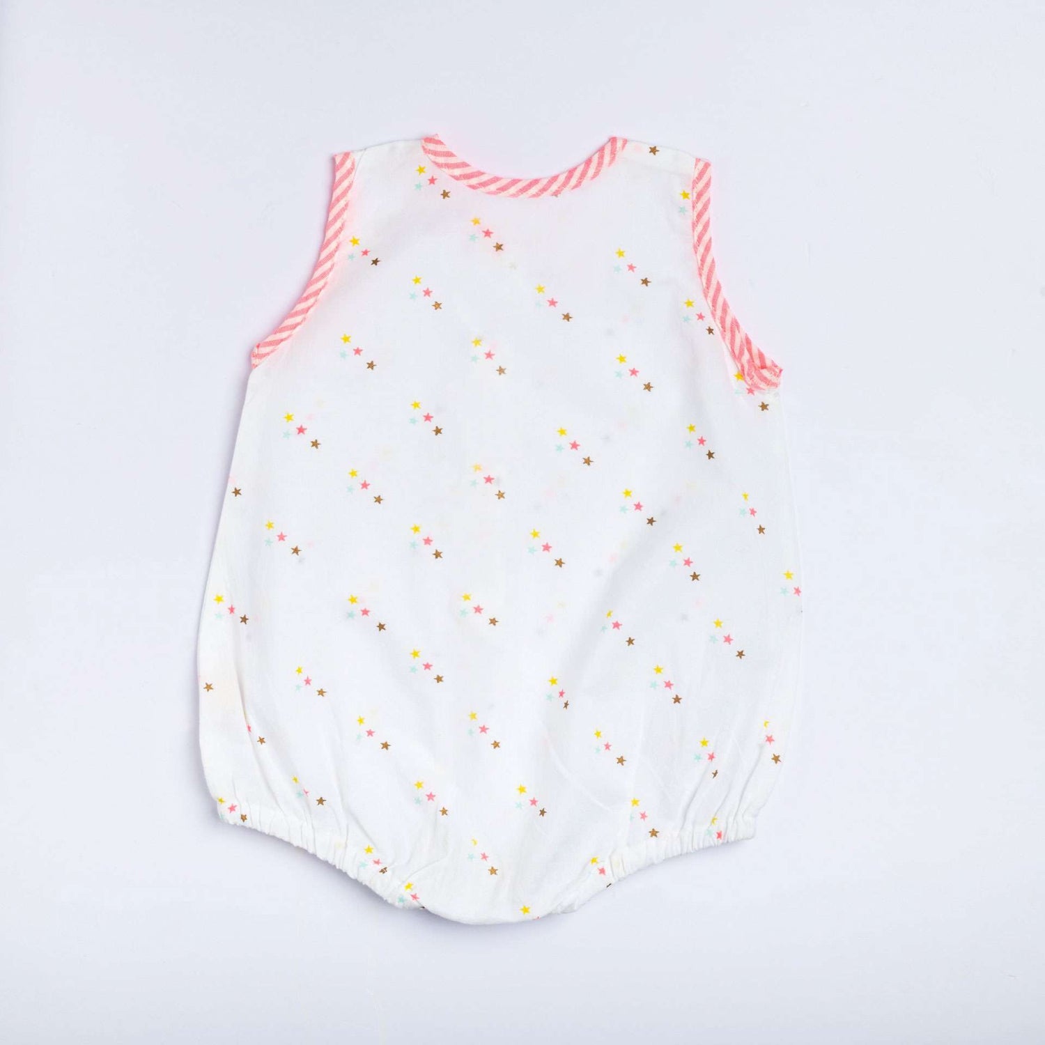 Back view of infant sleeveless romper with pink stripe piping and stars printed on a white base