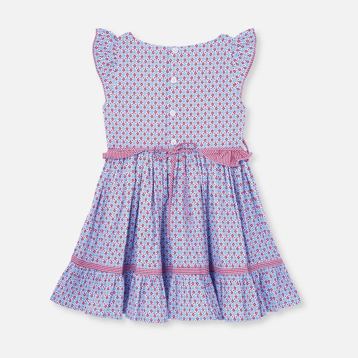 Rear image of red and blue printed dress with ruffled waistline, ruffled hem and small bow detail on bodice
