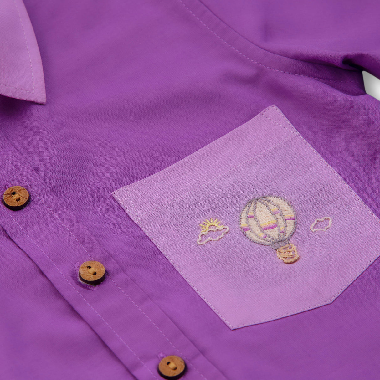 Pocket detail with hot air balloon embroidery