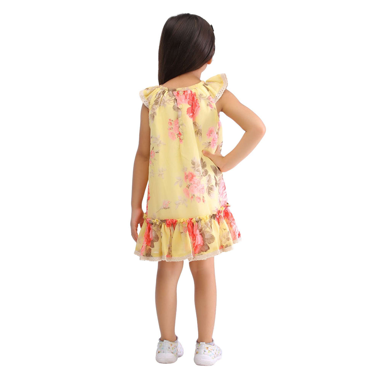 Yellow rose print chiffon dress back view on a girl
