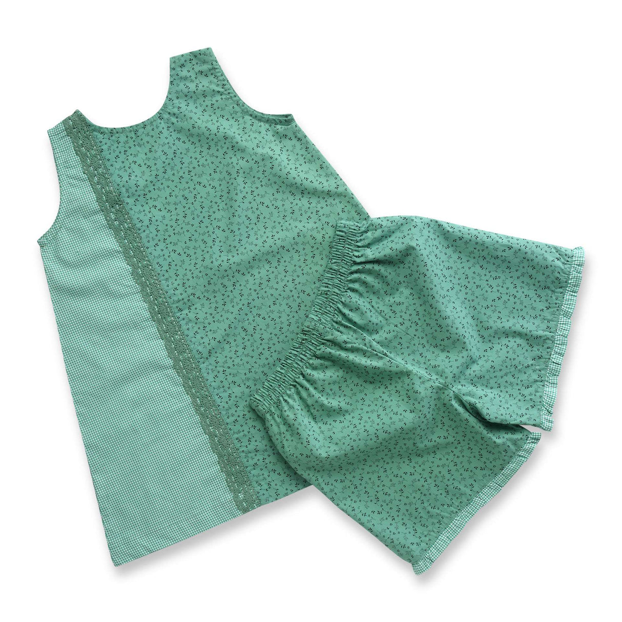 A-line girls jumper with a patchwork of a green print and green gingham and matched ruffle shorts