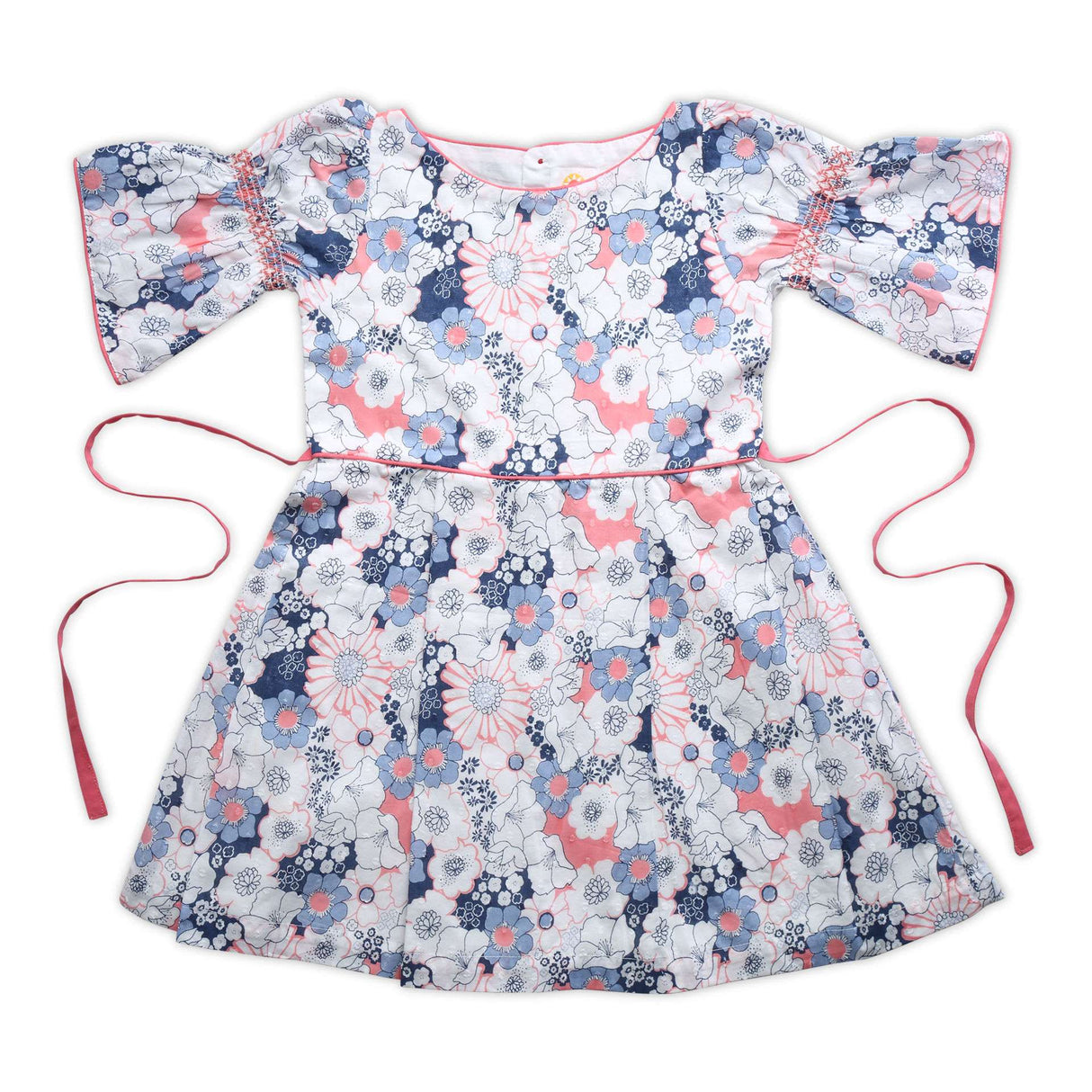 Flatlay of swiss dot pink and blue floral printed cotton dress with bell sleeves
