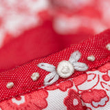 bullion rose hand embroidery on a coral piping edge