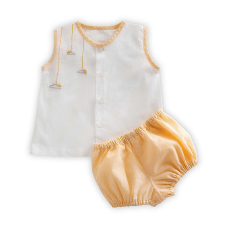 Infant diaper cover in yellow and front open jabla in white mull with cloud embroidery and yellow piping