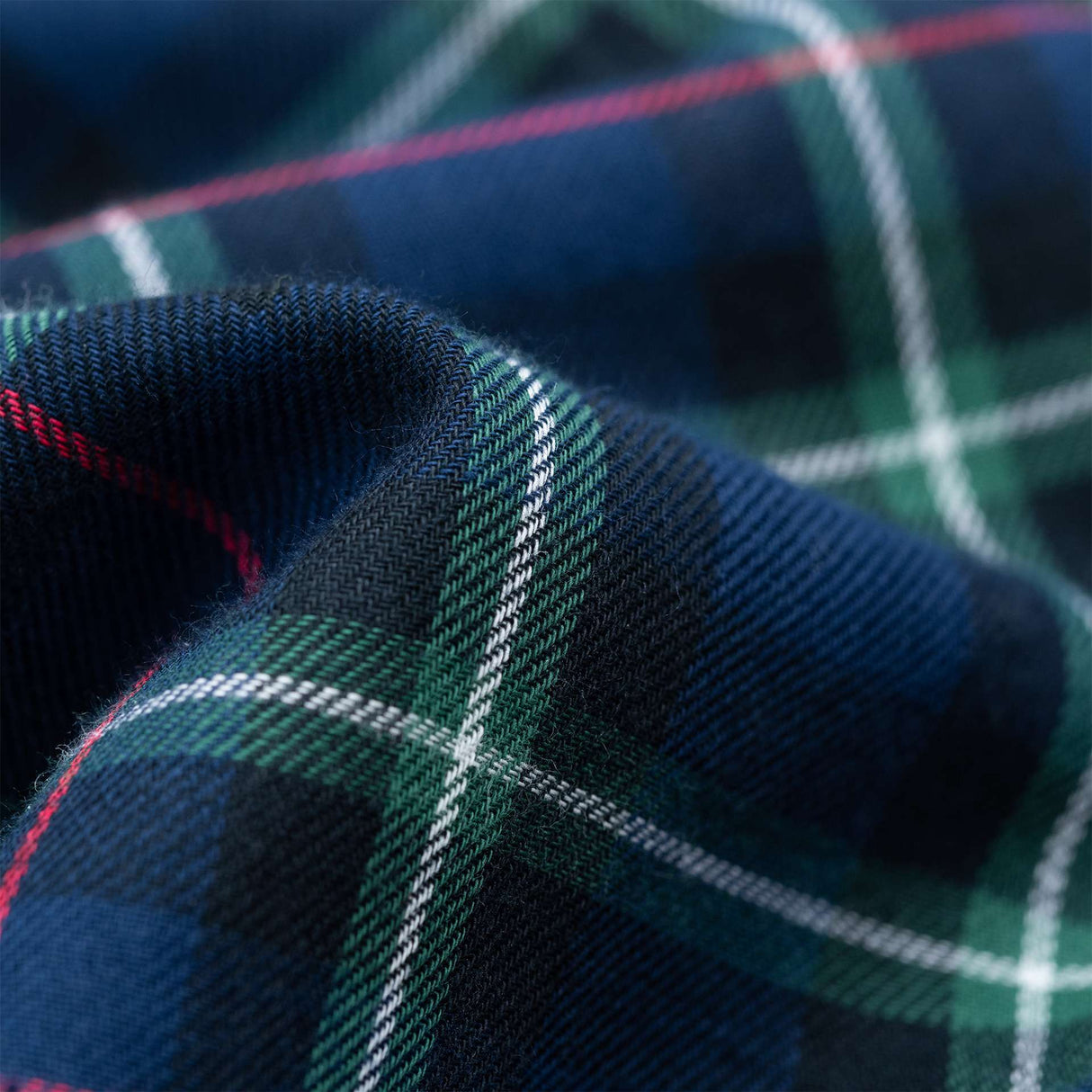 Navy and green tartan fabric