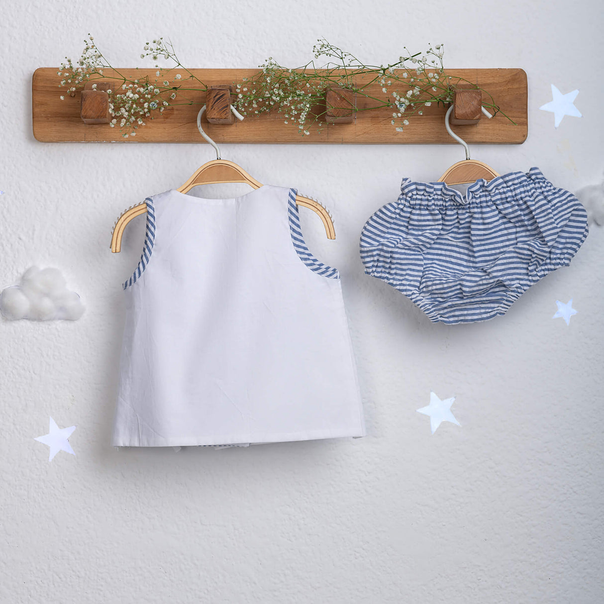 Reverse view of white hand-embroidered jabla and bloomer set from Soleilclo.