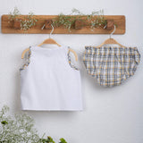Back view of white hand-embroidered jabla and bloomer set from Soleilclo.