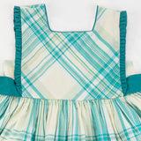 Close-up of the bodice of the green plaid cotton dress
