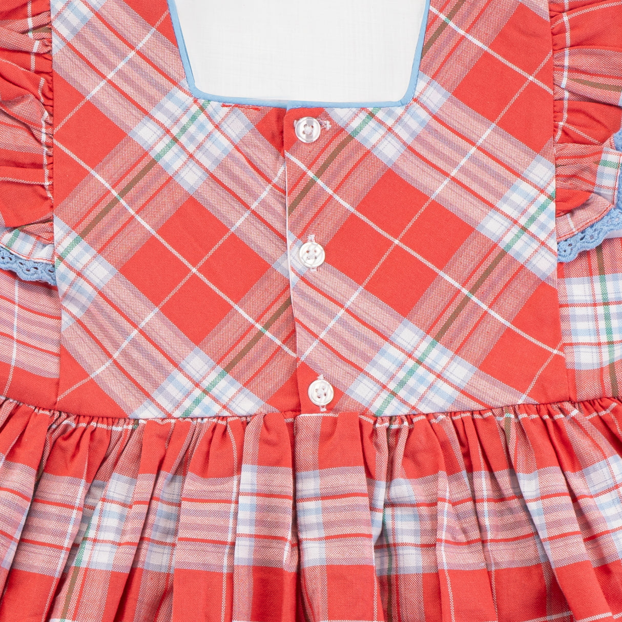 Close-up of the back buttons of the red & ivory plaid cotton dress