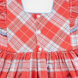 Close-up of the back buttons of the red & ivory plaid cotton dress