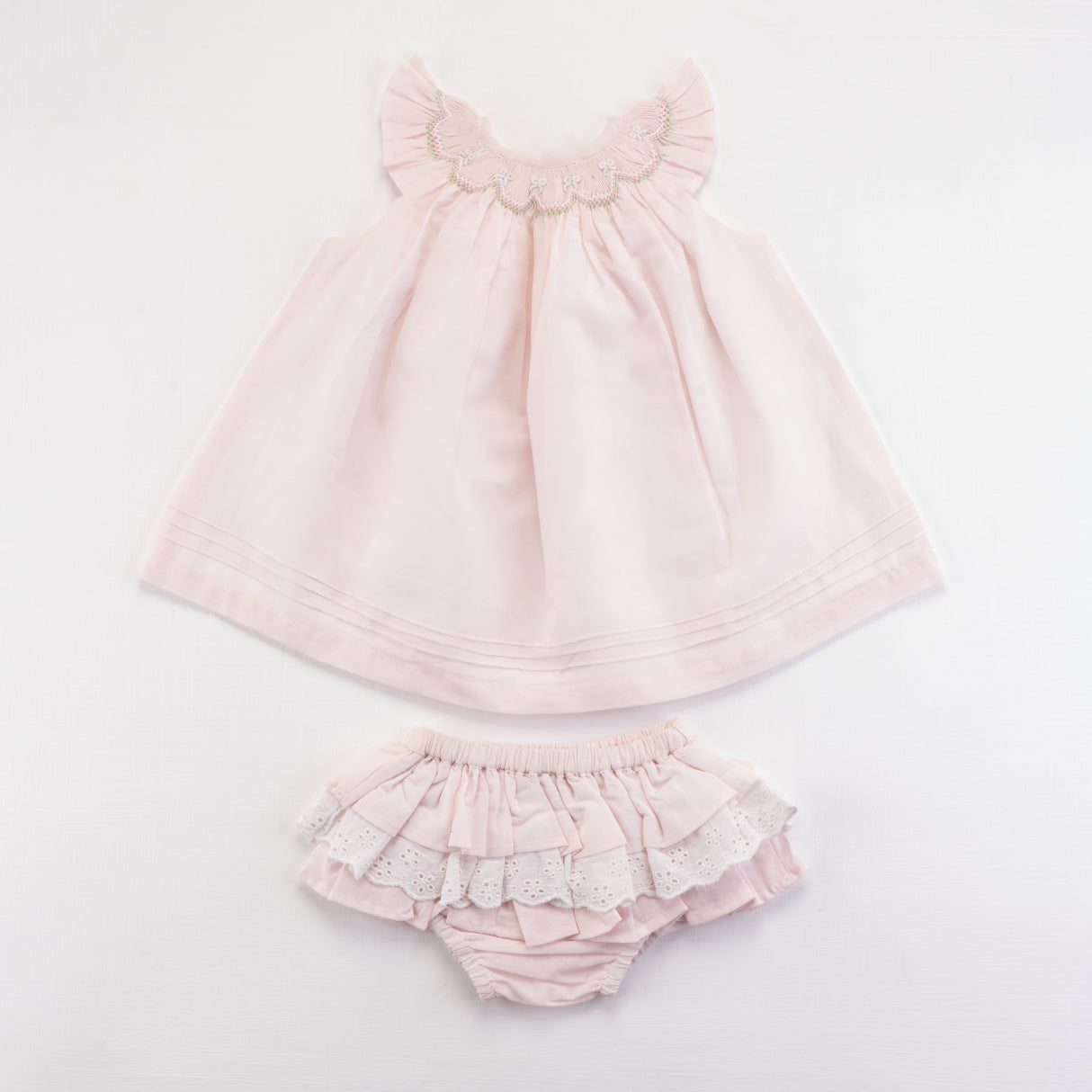 Front view of pink bishop and bloomer set