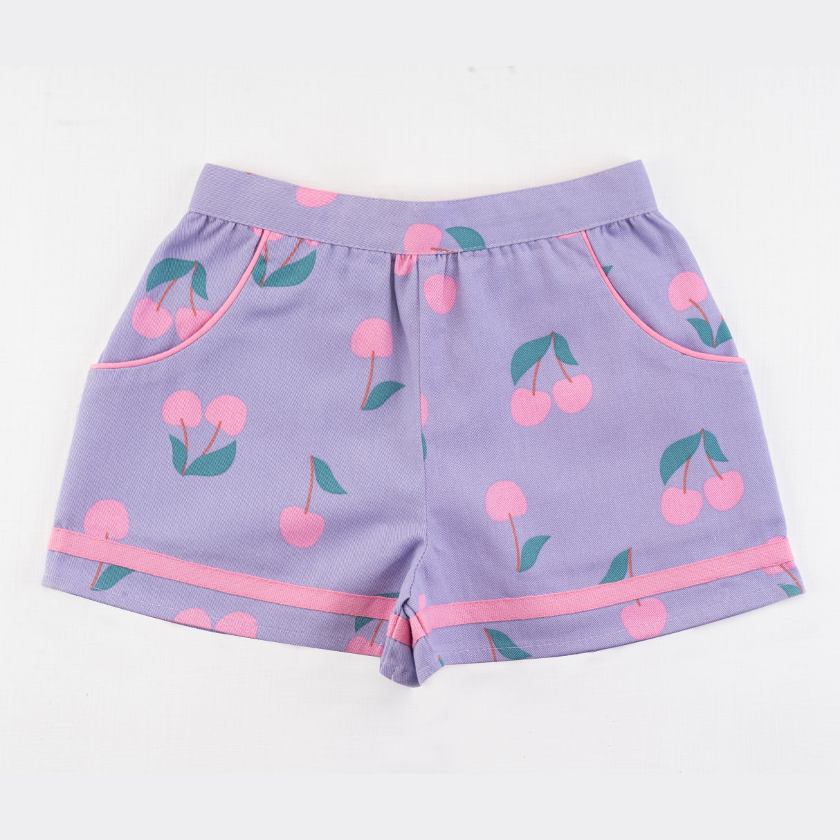 Front view of lilac & cherry print shorts