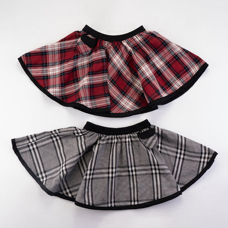 dual view of both sides of reversible checked skirt