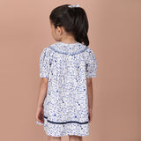 back view of the dress showing the back-button closure