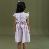 back view of pink dot print dress