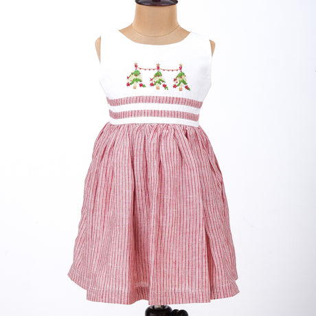 a mannequin in kids red and white striped Christmas tree embroidered dress