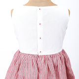 closeup of back-buttons of red and white striped girls dress