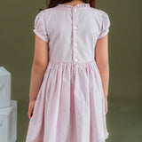 back view of pink crossover dress