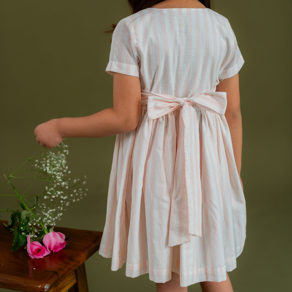 back view of striped embroidered dress