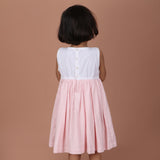 back view showing button closure and waist ties