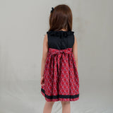 back view of the black scallop bodice dress