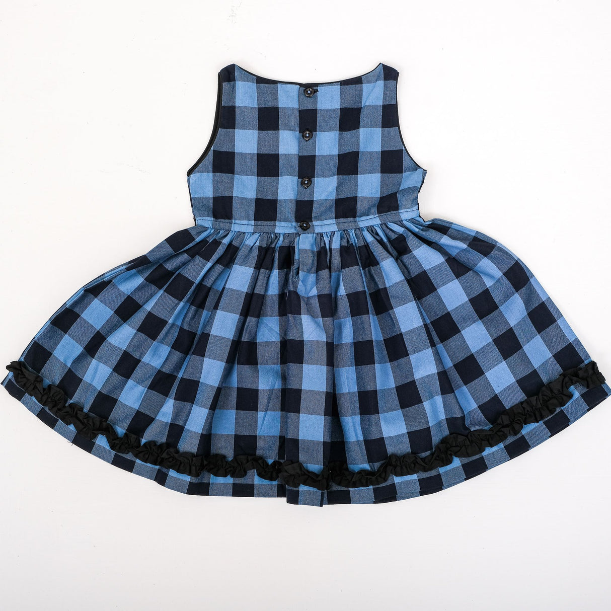 Back-view of blue and black check dress with back button closure