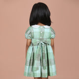 Back view of green check Peter Pan collar dress for girls