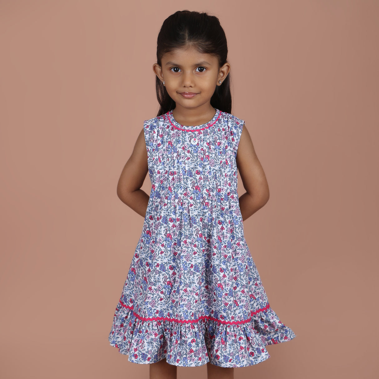 front angled view of blue A-line dress showing relaxed silhouette
