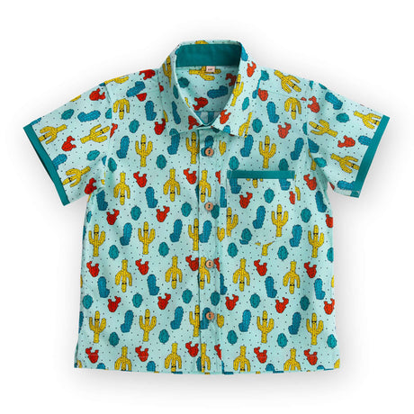 Flatlay of fancactus shirt featuring coordinated fabric bands stitched underneath the pocket and sleeve hems