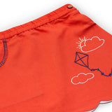 Close-up of cotton solid orange hand embroidered skirt with a scallop hem